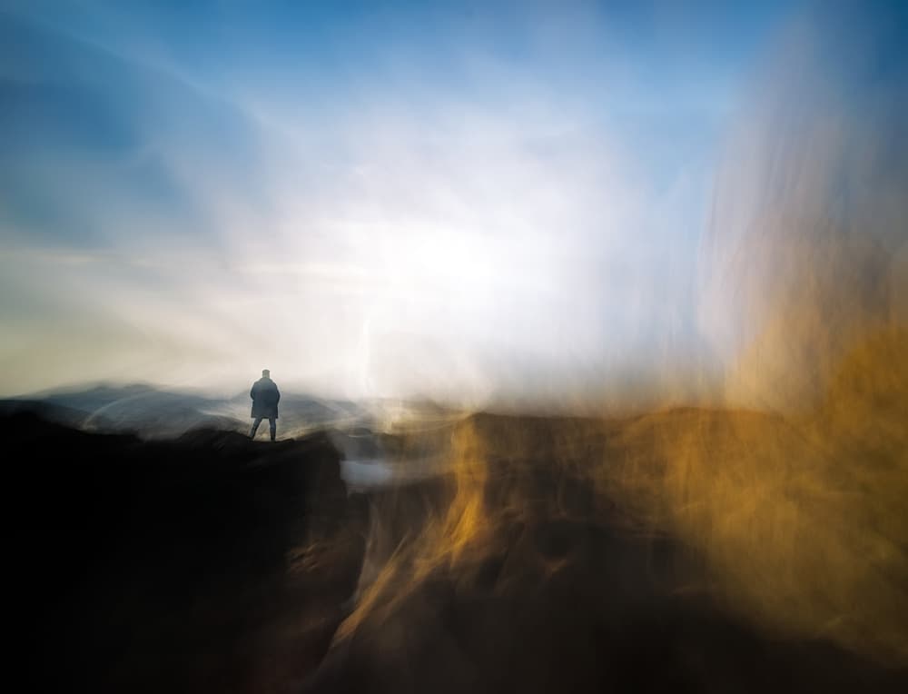 Man On Cliff Edge by Santiago Pascual Buye — canvas wall art