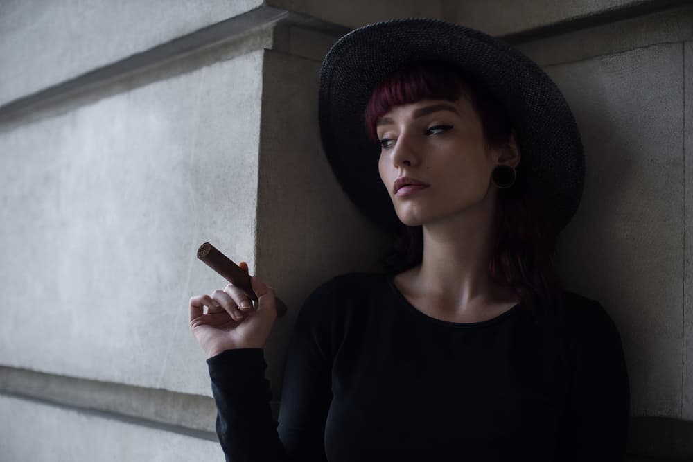 Pensive Woman With Cigar by Bobby Kostadinov — canvas wall art