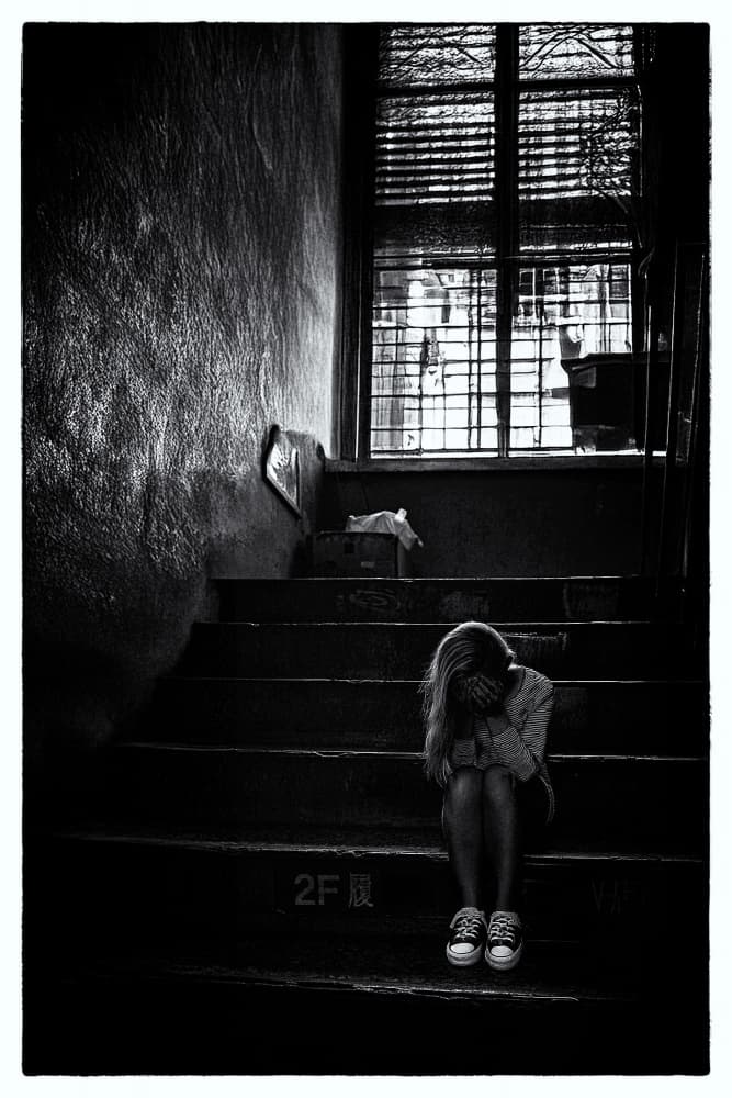 Girl in Shadowed Stairwell by Parole Kim — canvas wall art