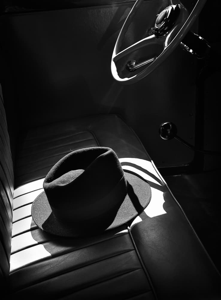 Fedora In Vintage Car by Barbara Read — canvas wall art