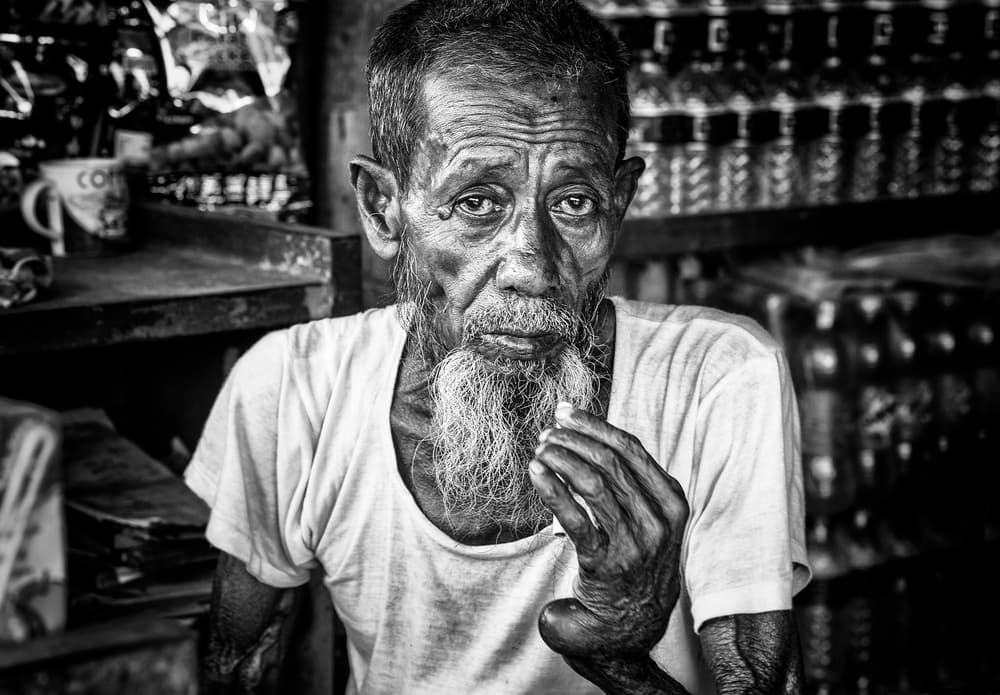 Elderly Man's Pensive Gaze by Joxe Inazio Kuesta Garmendia — canvas wall art