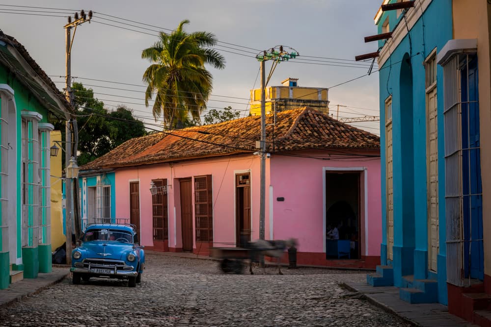 Vibrant Cuban Street Car by John Deakin — canvas wall art