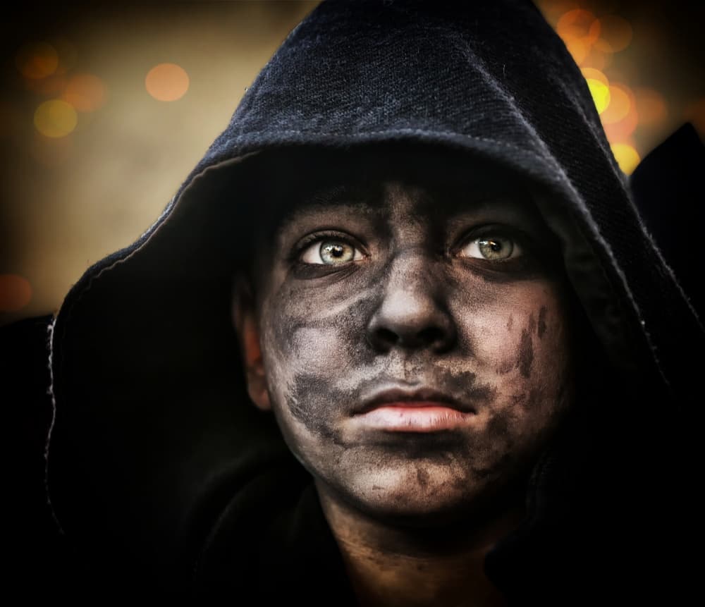 Hooded Child's Intense Gaze by Daniele Atzori — canvas wall art