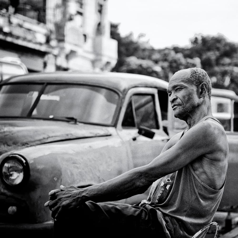 Thoughtful Man Vintage Car by Aleksander Poniewierski — canvas wall art