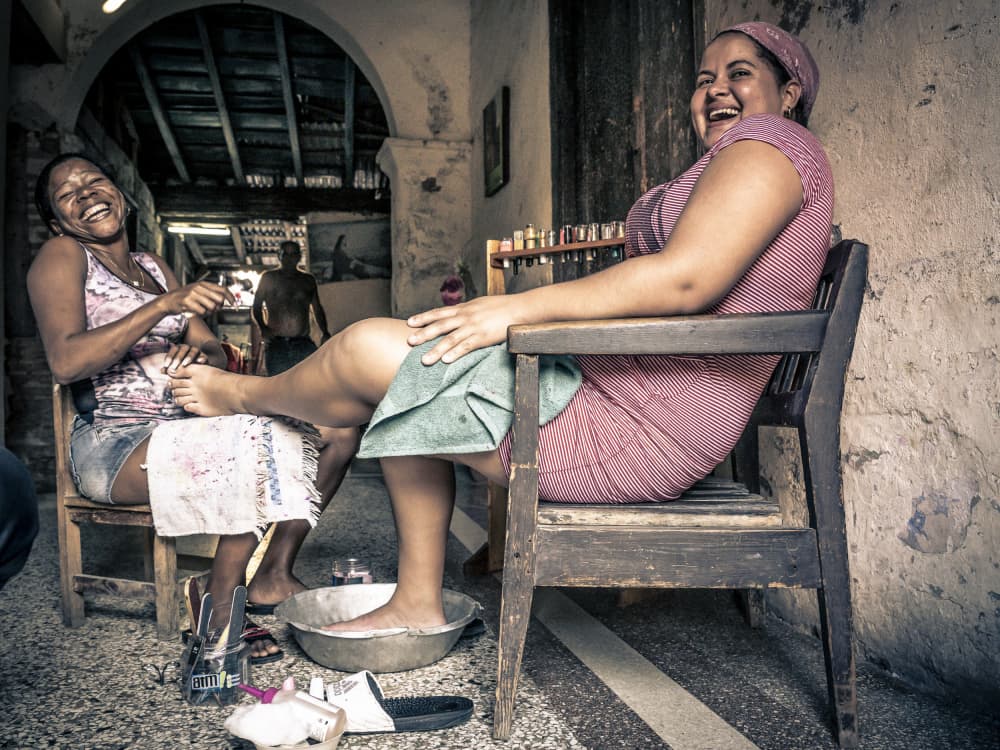 Joyful Pedicure Laughter by Eyal Alcalay — canvas wall art