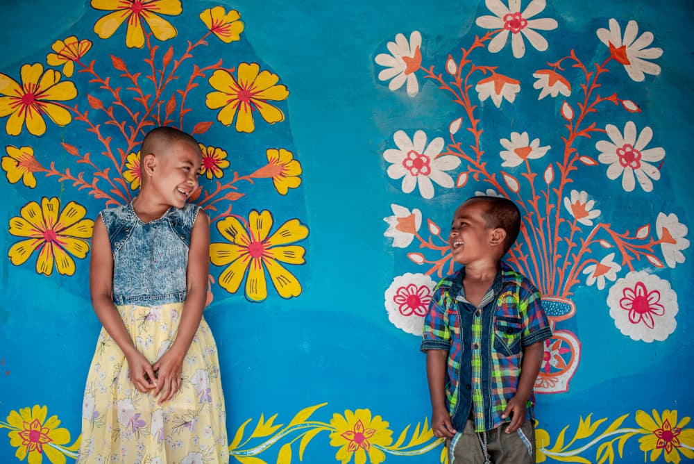 Happy Children Floral Wall by Rakibul Alam Khan — canvas wall art