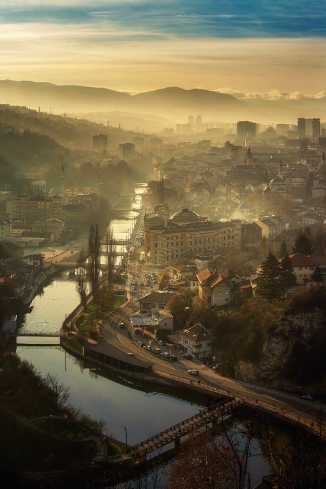 Misty River City Morning by Bez Dan — canvas wall art
