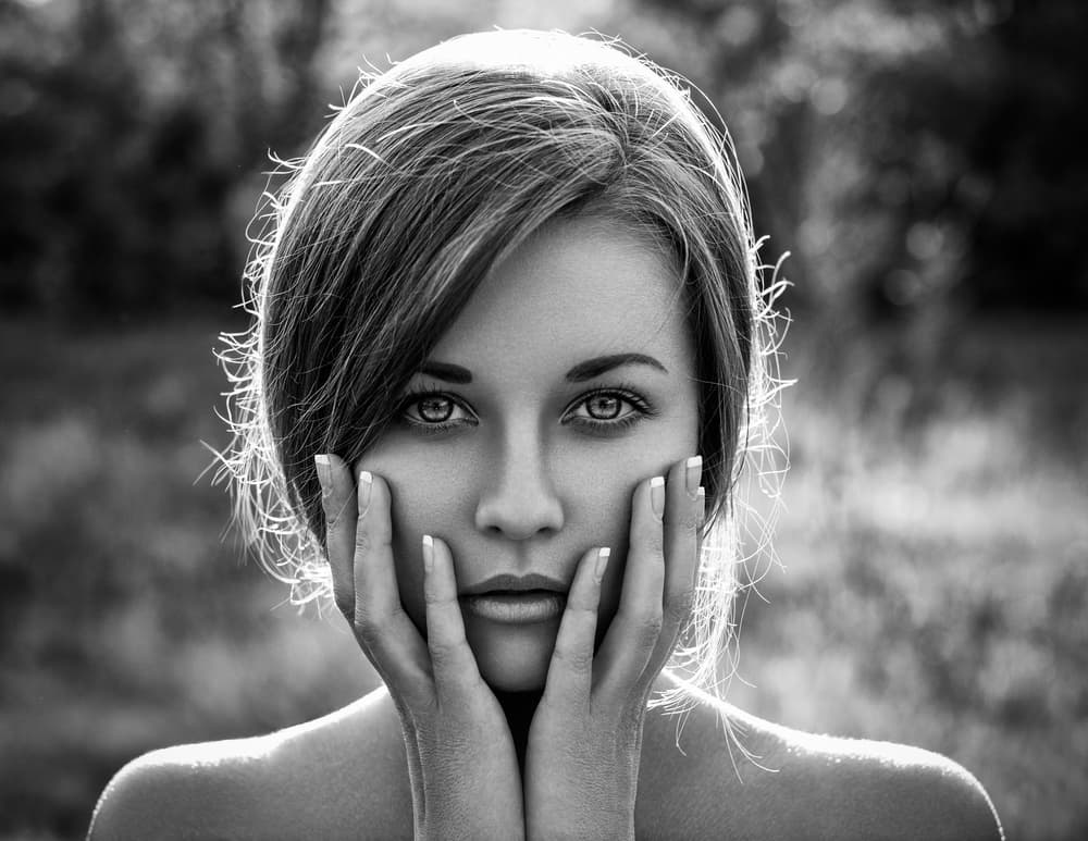 Thoughtful Gaze Portrait by HIM — canvas wall art