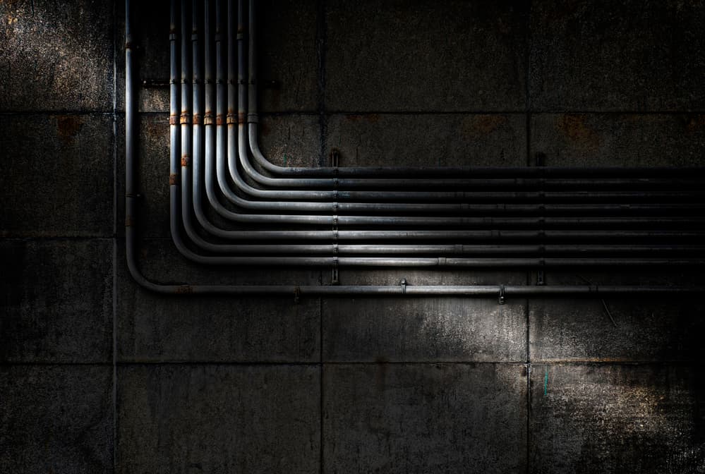 Dark Industrial Pipes by Wim Schuurmans — canvas wall art