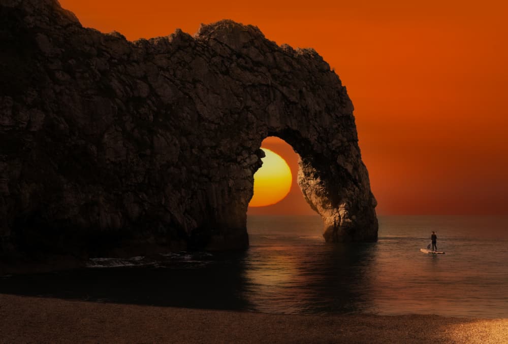Serene Arch Sunset Paddle by Nikki Georgieva V E G A N I K — canvas wall art
