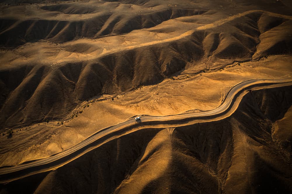 Winding Desert Road by Isam Telhami — canvas wall art