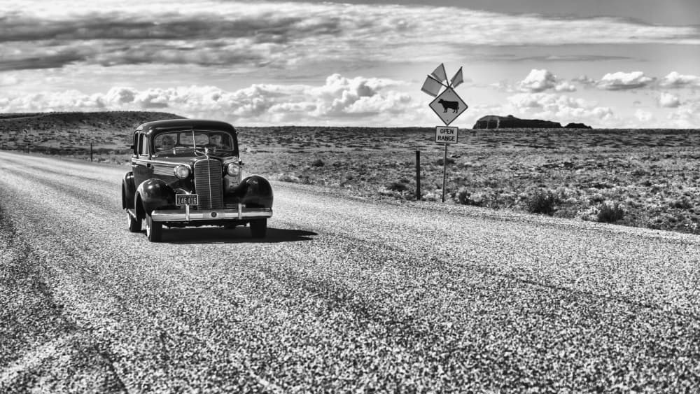 Vintage Car on Desert Road by Andreas Klesse — canvas wall art