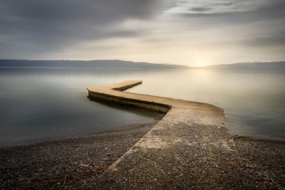 Serene Lake Pier Sunset by Petar Boskovski — canvas wall art
