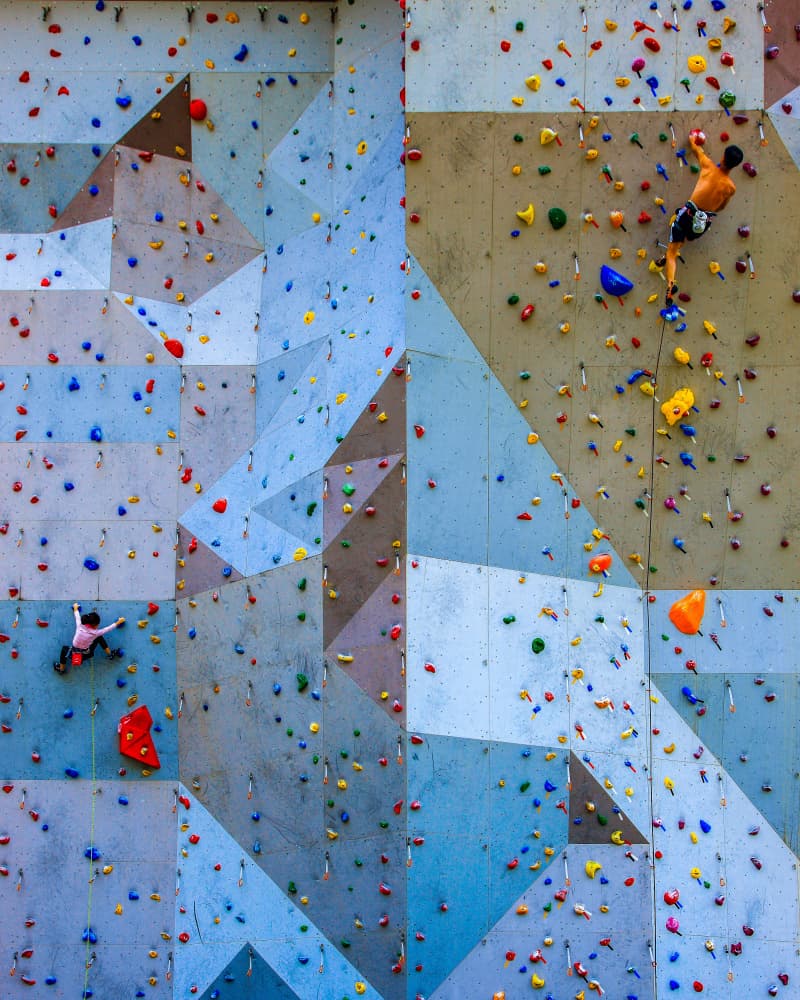 Climbers On Colorful Wall by Shin Woo Ryu — canvas wall art