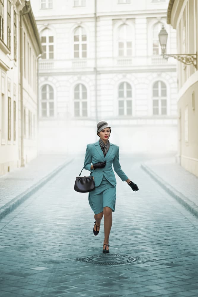 Vintage Woman Running by Ildiko Neer — canvas wall art