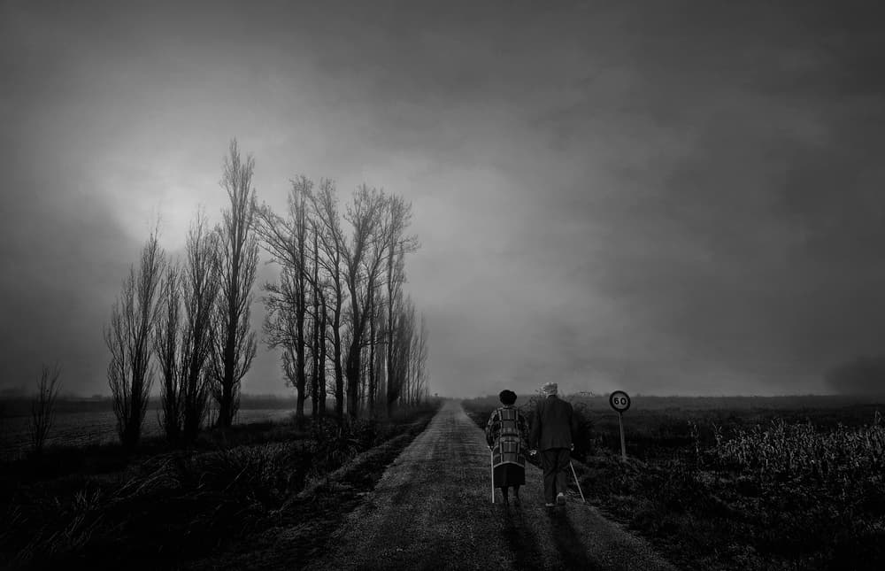 Elderly Couple's Long Walk by Jose C. Lobato — canvas wall art