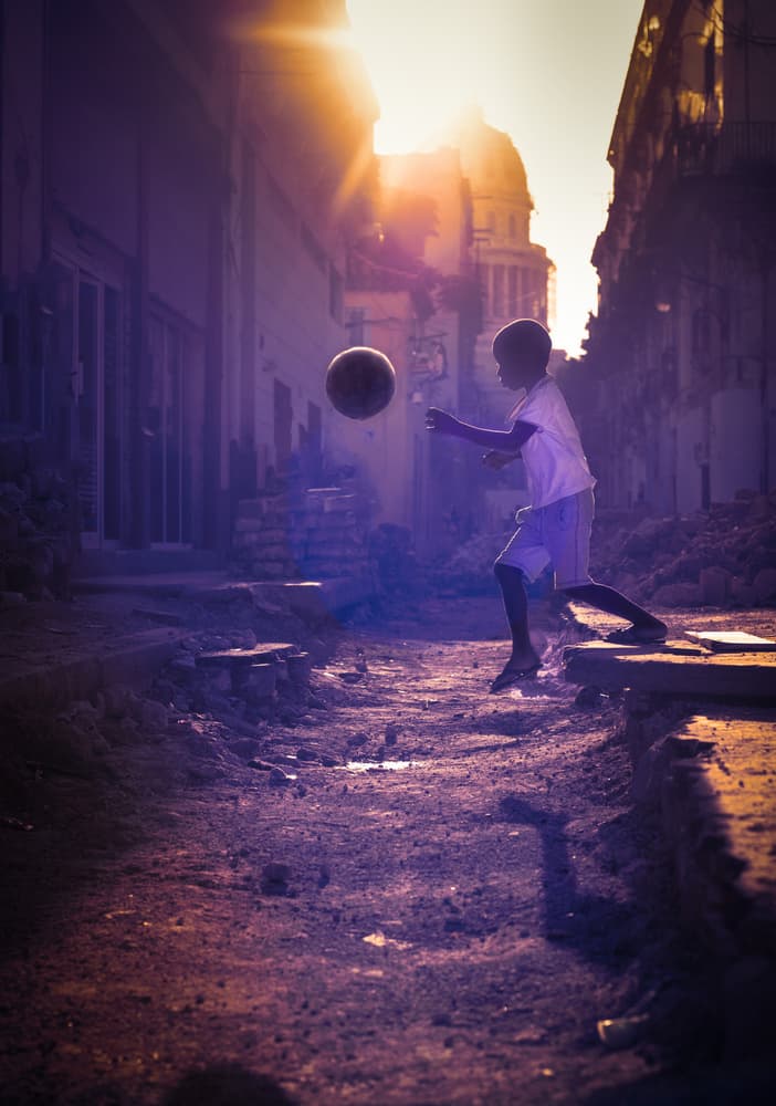 Havana Boy Playing Ball by Jean-Luc BESSON — canvas wall art