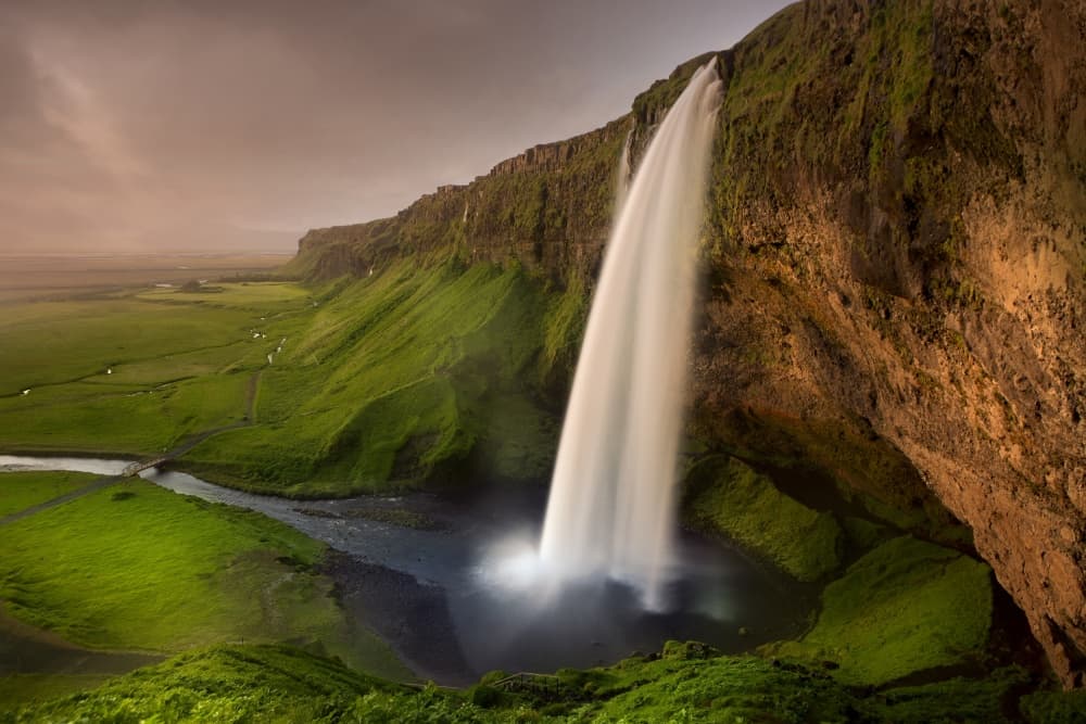 Majestic Valley Waterfall by Nicolas Schumacher — canvas wall art