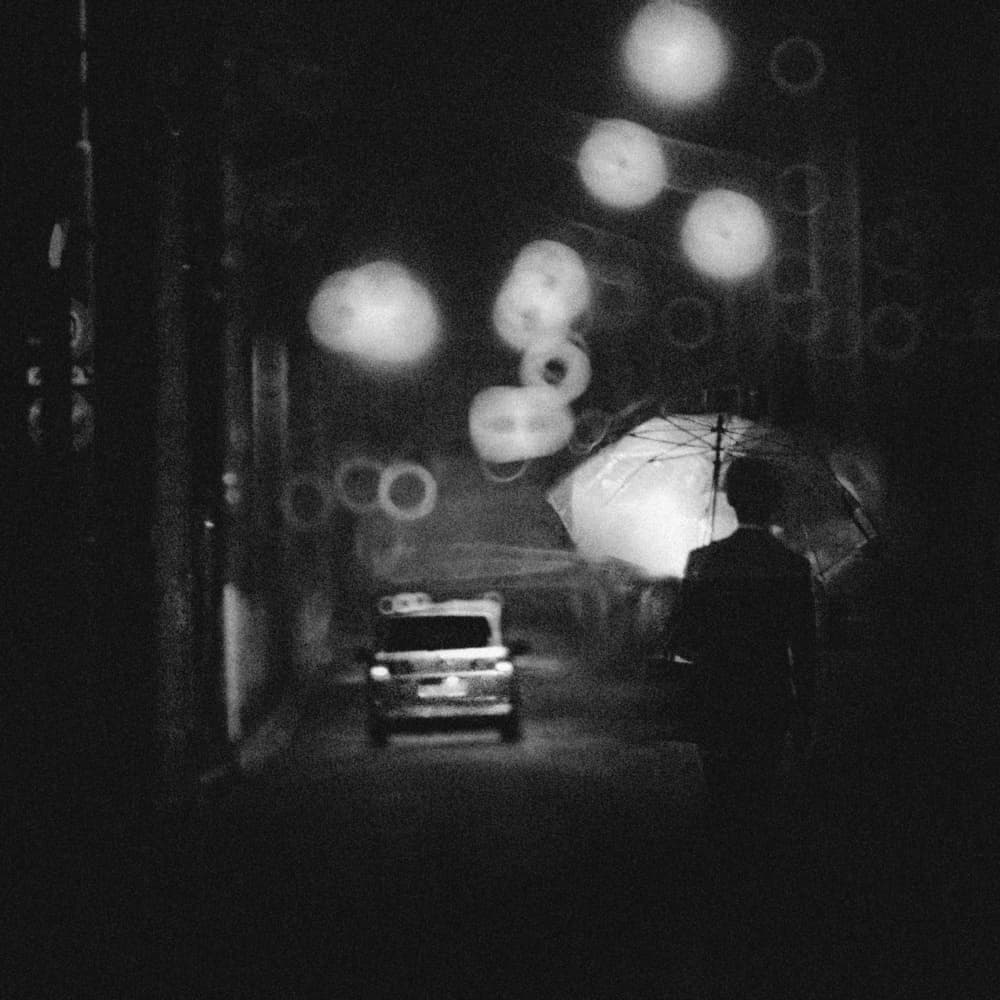 Rainy Night Street by Teruhiko Tsuchida — canvas wall art