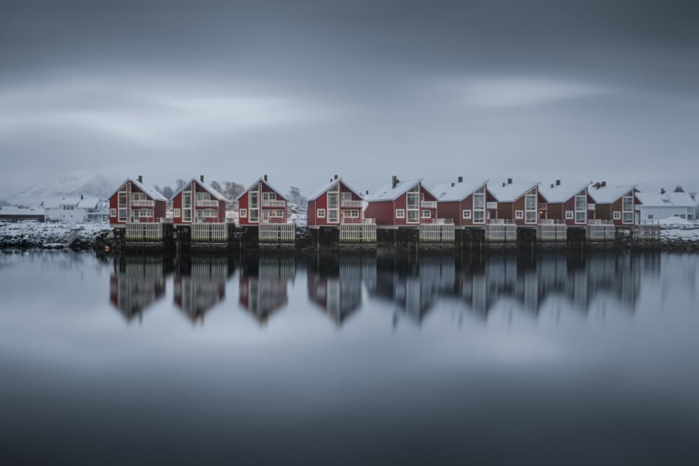 Red Houses Winter Reflections by Tony Xu — canvas wall art