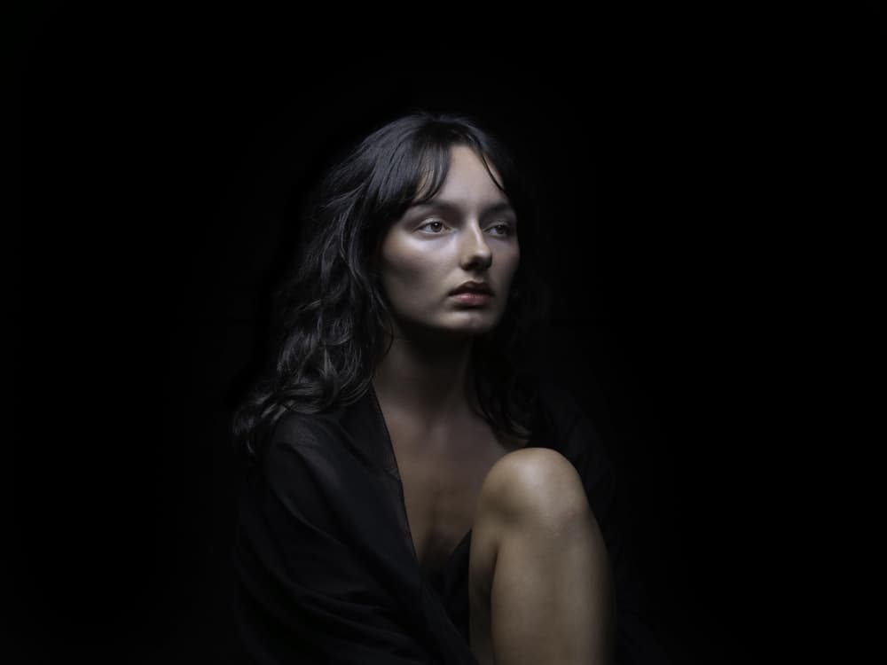 Pensive Woman Portrait by Sam SDFMedia — canvas wall art