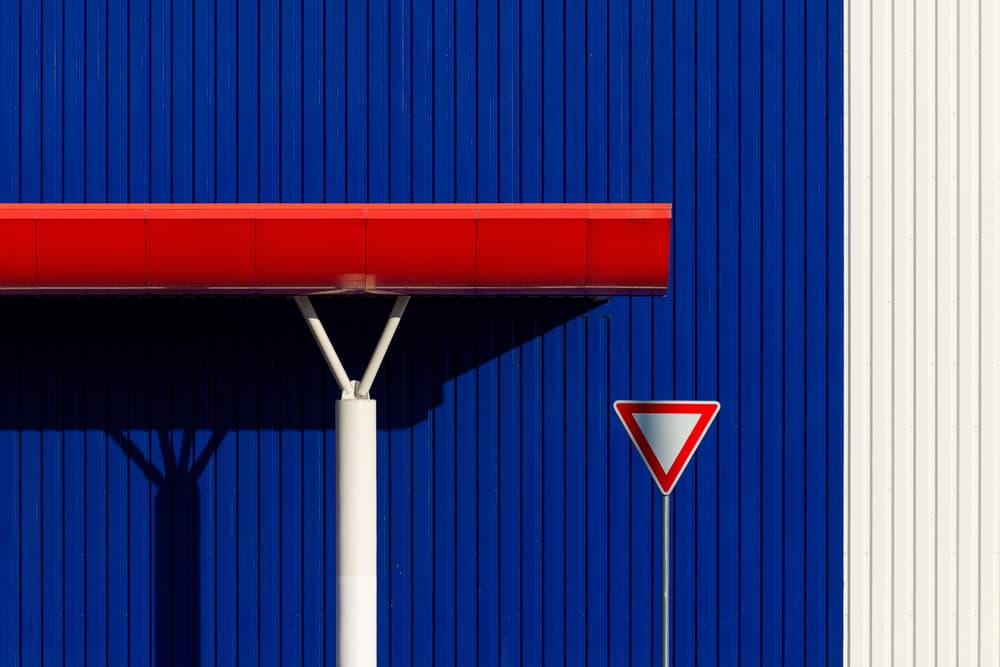 Blue Red Architectural Detail by Karol Važan — canvas wall art