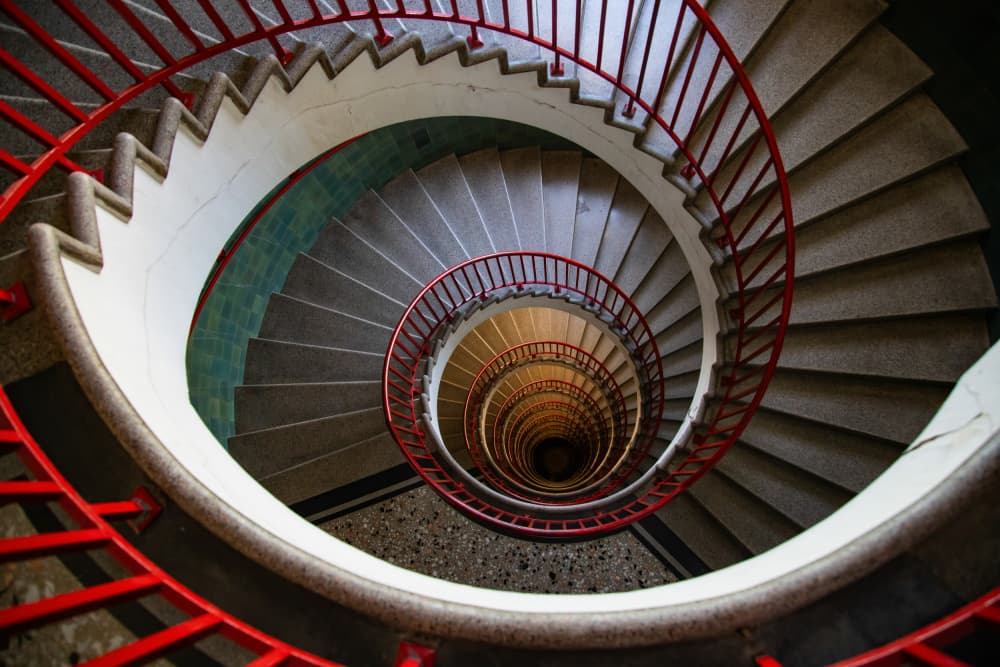 Red Spiral Stairs by Eros Erika — canvas wall art