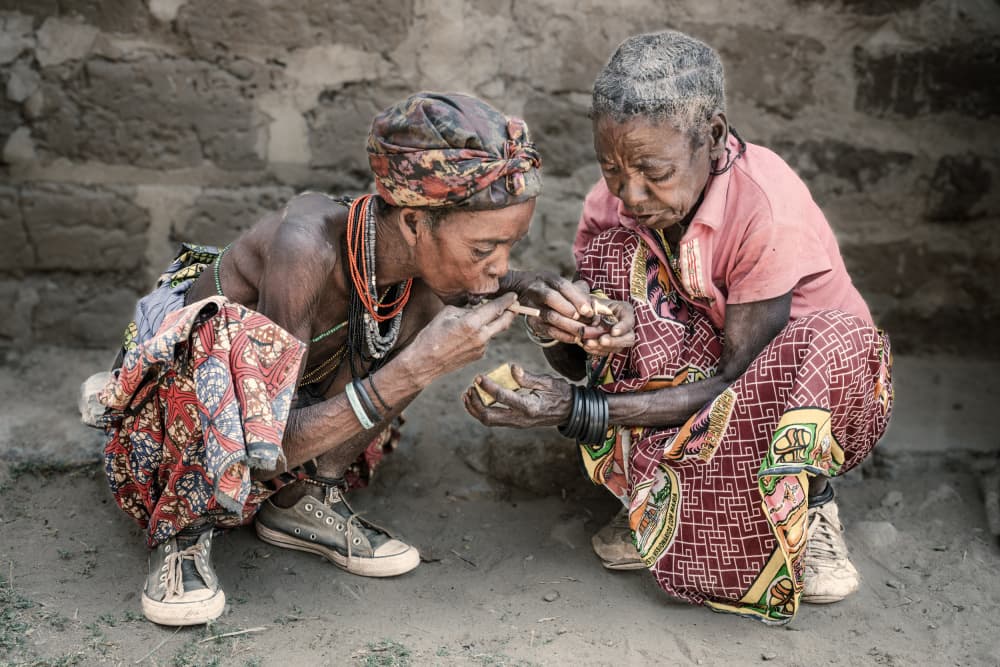 African Women Sharing Food by Trevor Cole — canvas wall art