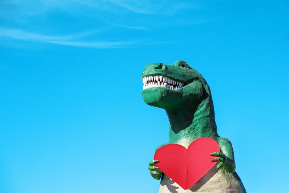 Tyrannosaurus Rex with a Red Paper Heart by Tom Windeknecht — canvas wall art