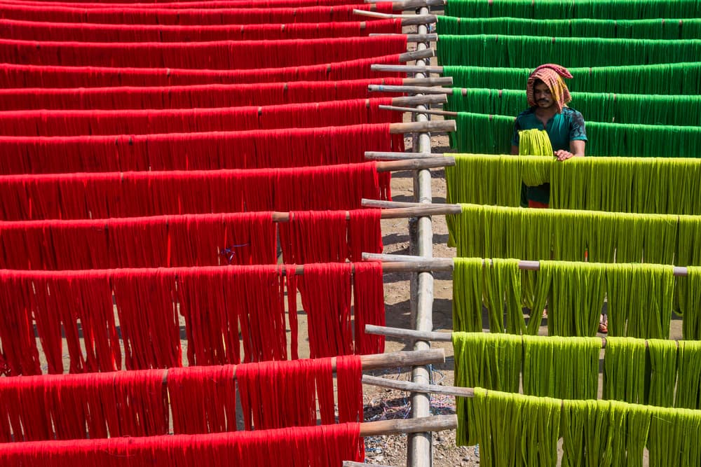 Vibrant Yarn Drying by Saurabh Sirohiya — canvas wall art