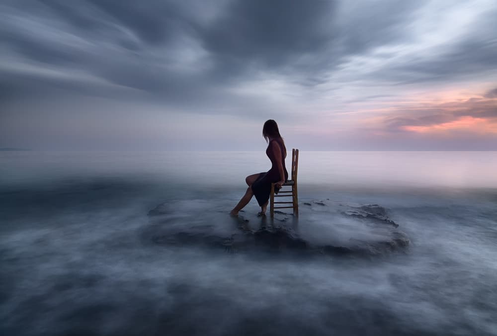 Pensive Woman Ocean Mist by Maria Kaimaki — canvas wall art