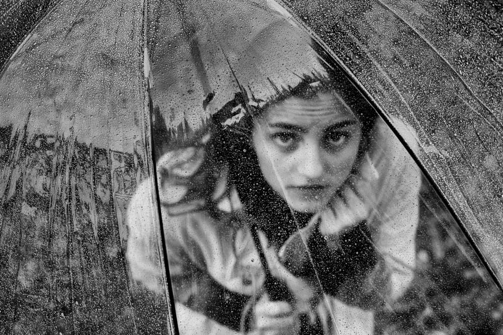 Woman Through Raindrops by Eric Drigny — canvas wall art