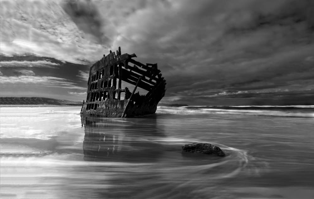 Abandoned Shipwreck Beach by Mei Shi — canvas wall art
