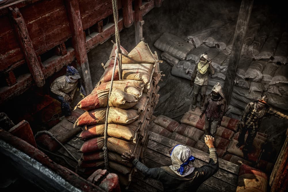 Workers Loading Cargo by Hari Sulistiawan — canvas wall art