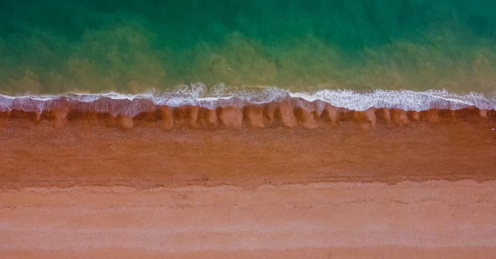 Emerald Ocean Shore by Marian V Munteanu — canvas wall art