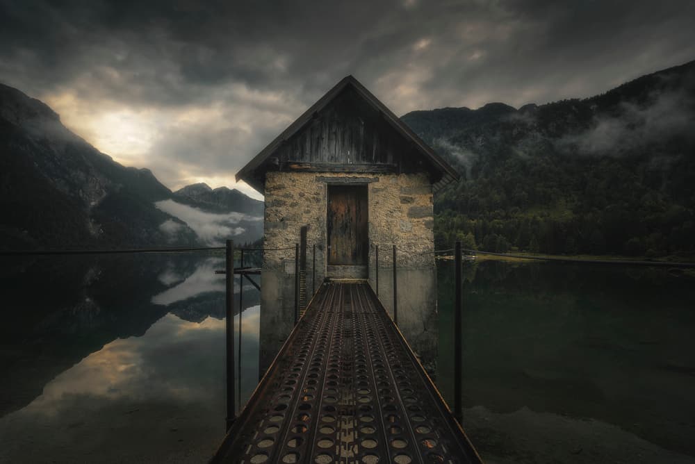 Dramatic Lake Boathouse by Thomas de Franzoni — canvas wall art