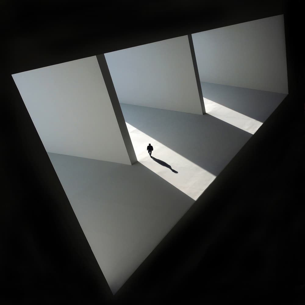 Lone Figure Shadow by Huib Limberg — canvas wall art