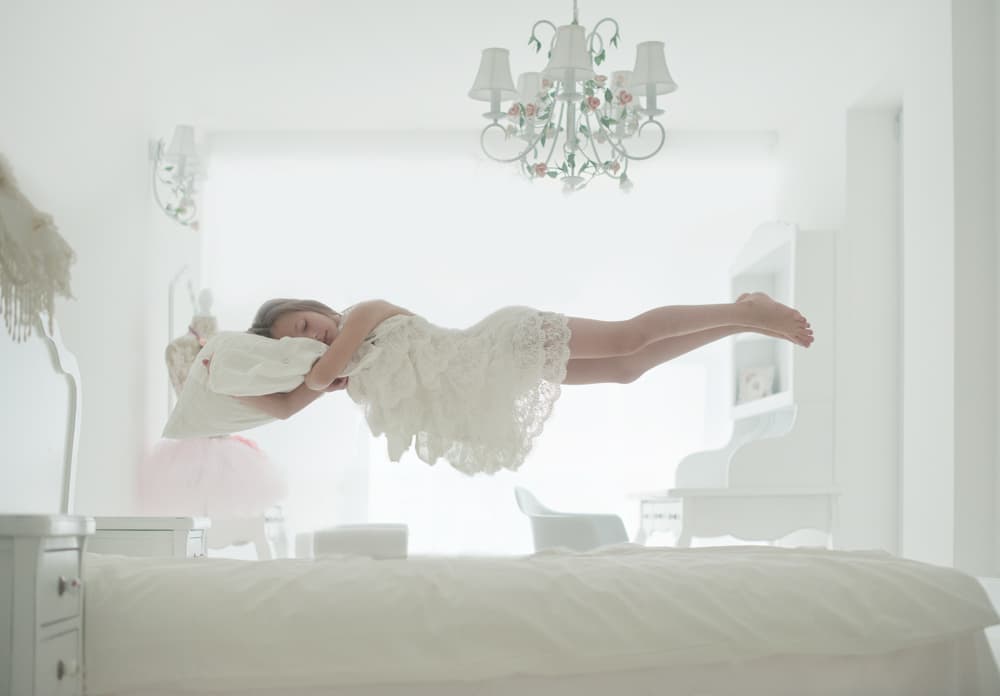 Floating Dreamer by Elena Karagyozova — canvas wall art