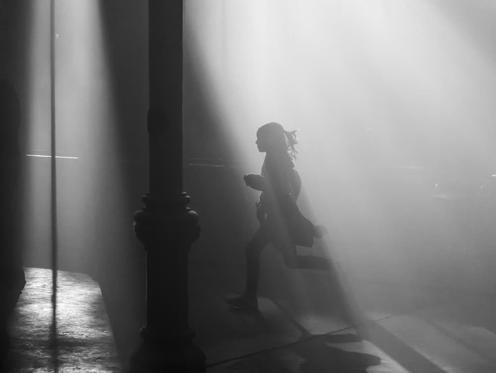 Child Running Through Light by Adolfo Urrutia — canvas wall art