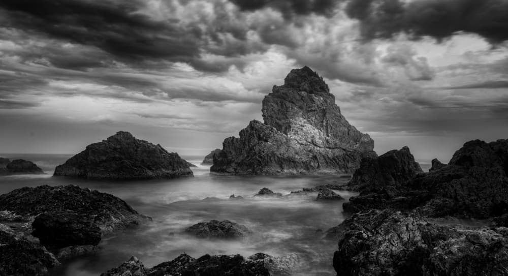 Moody Sea Stacks by TaranSohal — canvas wall art