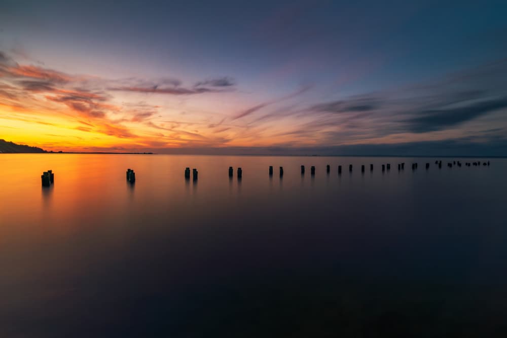 Pilings at Sunset by Ivo Mateju — canvas wall art