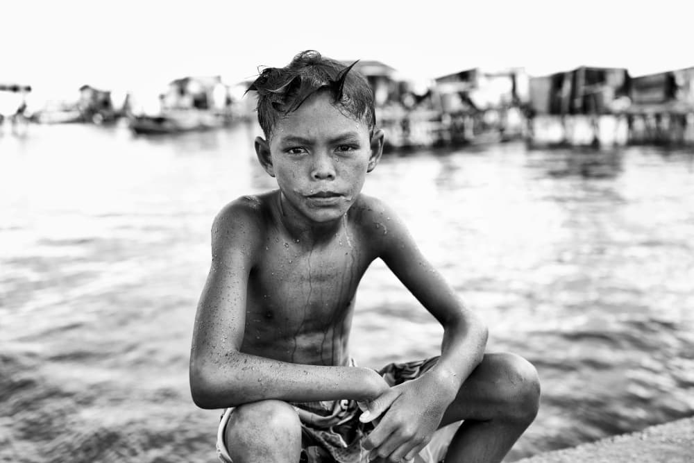 Pensive Village Boy by Kieron Long — canvas wall art