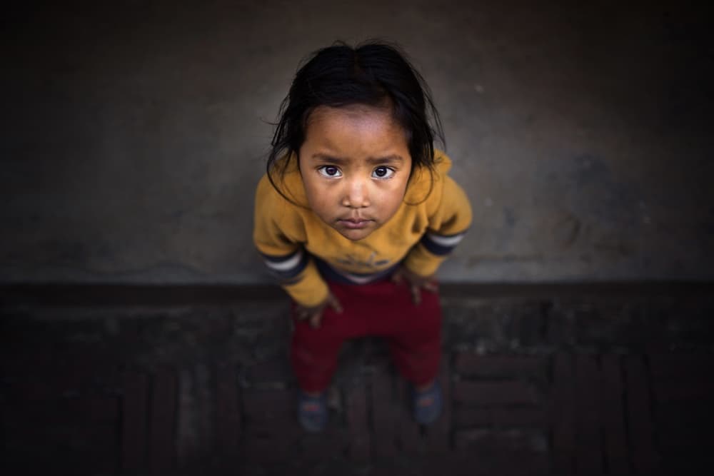 Child's Upward Gaze by Mohammed Baqer — canvas wall art