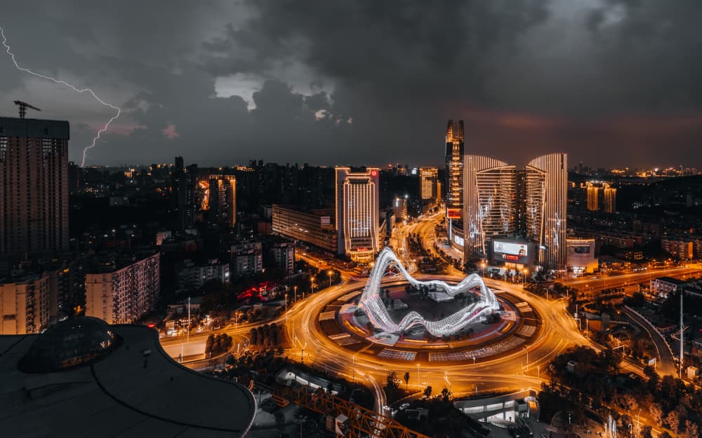 Lightning Over City Lights by Ruochen Shen — canvas wall art