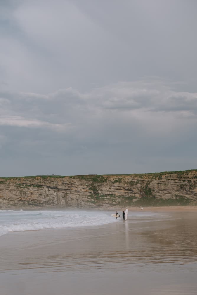 Coastal Surfers Walk by Claudia Casal — canvas wall art