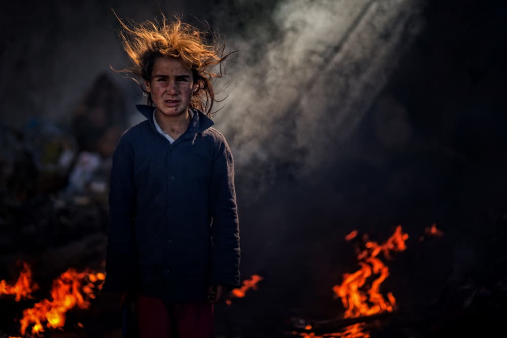 Youth Amidst Fire by Merthan Kortan — canvas wall art