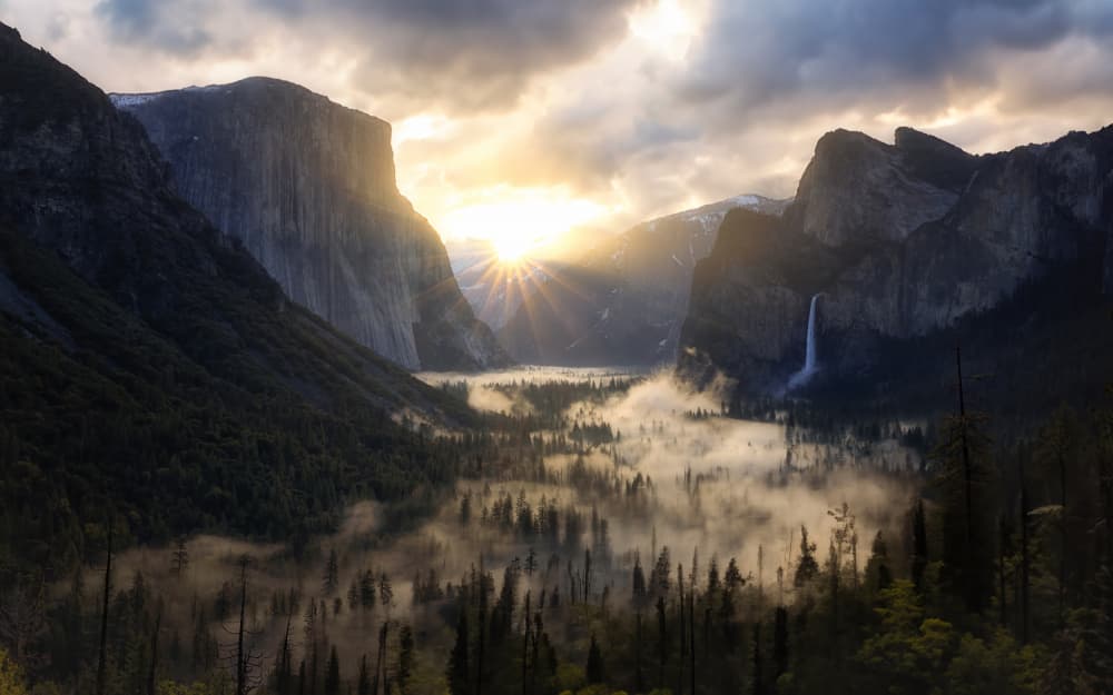 Sunburst Over Misty Valley by Michael Zheng — canvas wall art