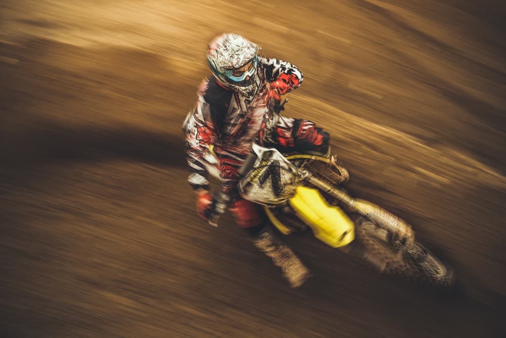 Motocross Rider In Motion by Carlos Gonzalez — canvas wall art