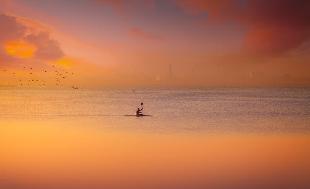 Lone Kayaker Sunset by joanaduenas — canvas wall art