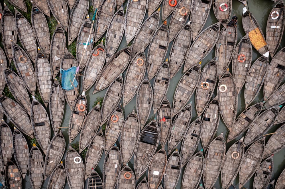 Crowded River Boats by Azim Khan Ronnie — canvas wall art